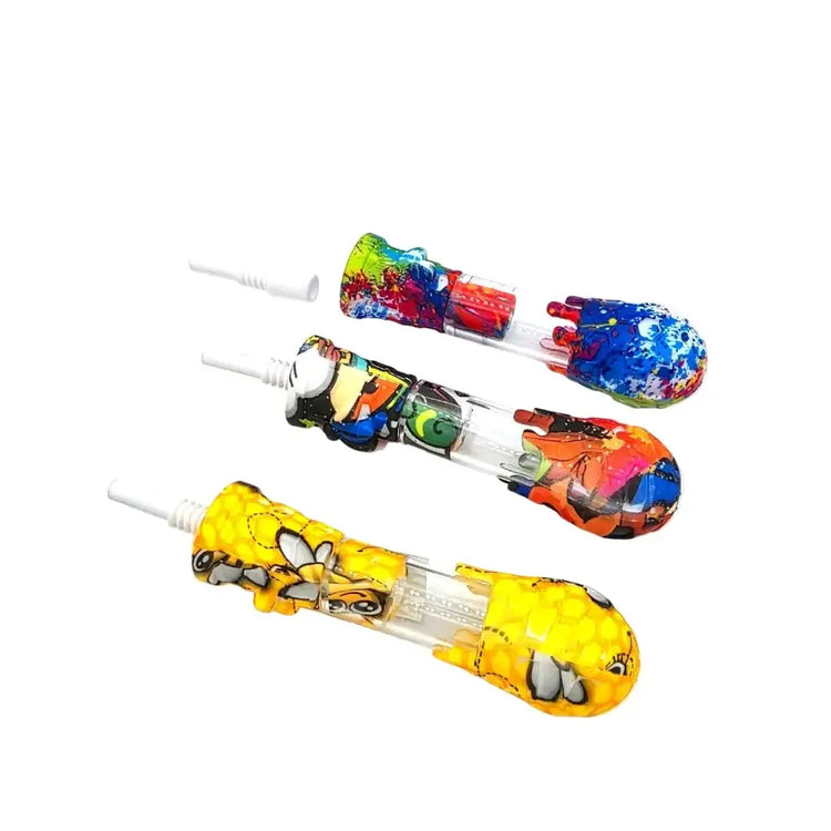 Three colorful silicone glass straws with cartoon designs and 10mm ceramic nail for smooth airflow use